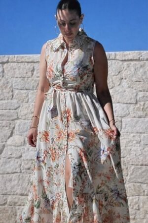 Disfruta de la primavera con nuestro vestido camisero sin mangas de OH.LA. Un diseño fluido con estampado floral y cinturón para realzar tu belleza real.